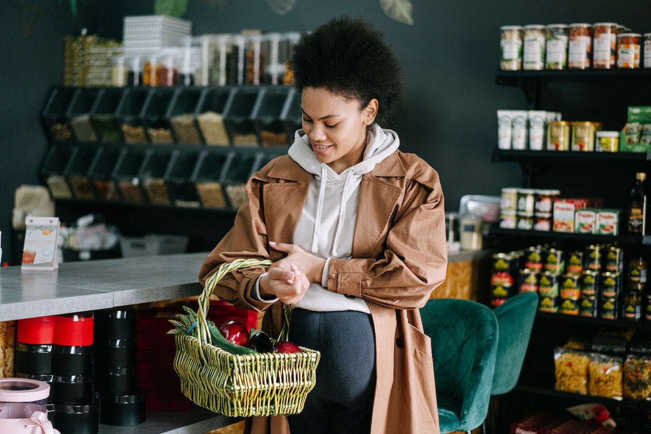 Woman shops in a grocery store in Canada
