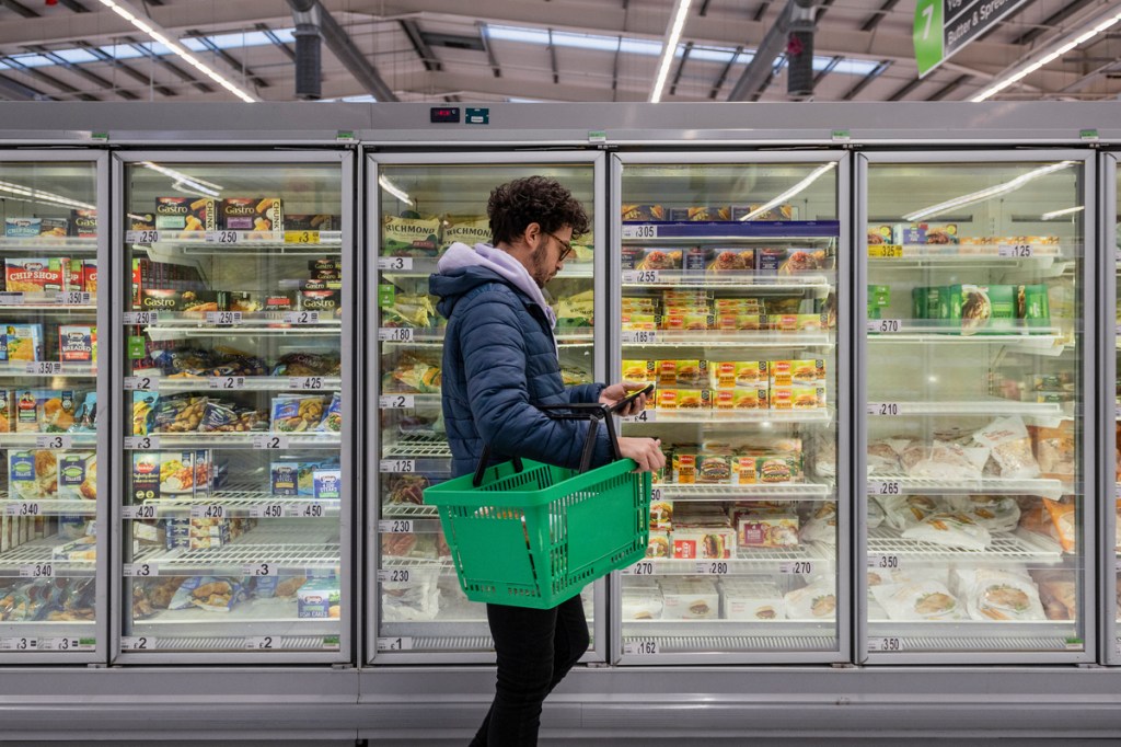 Consumer on SNAP benefits shopping for food.