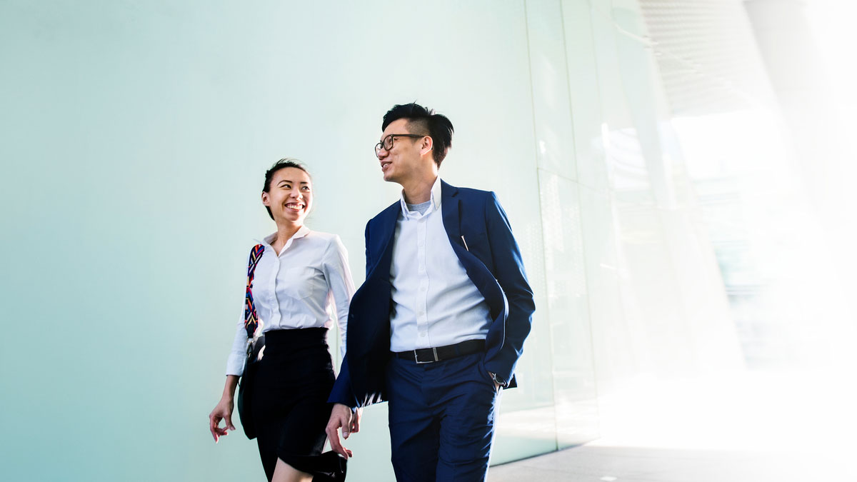 Two Vietnamese business partners walking