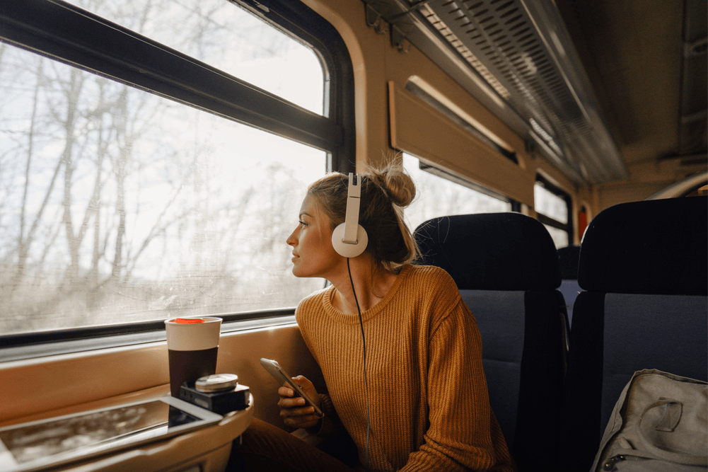 girl in the train with her phone