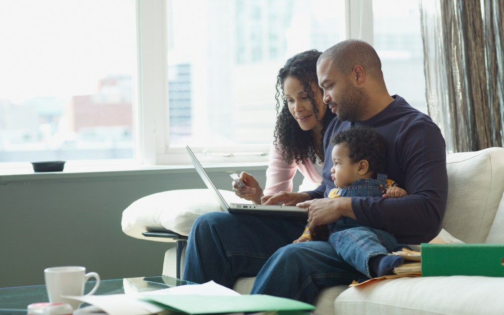 family paying bills or shopping online