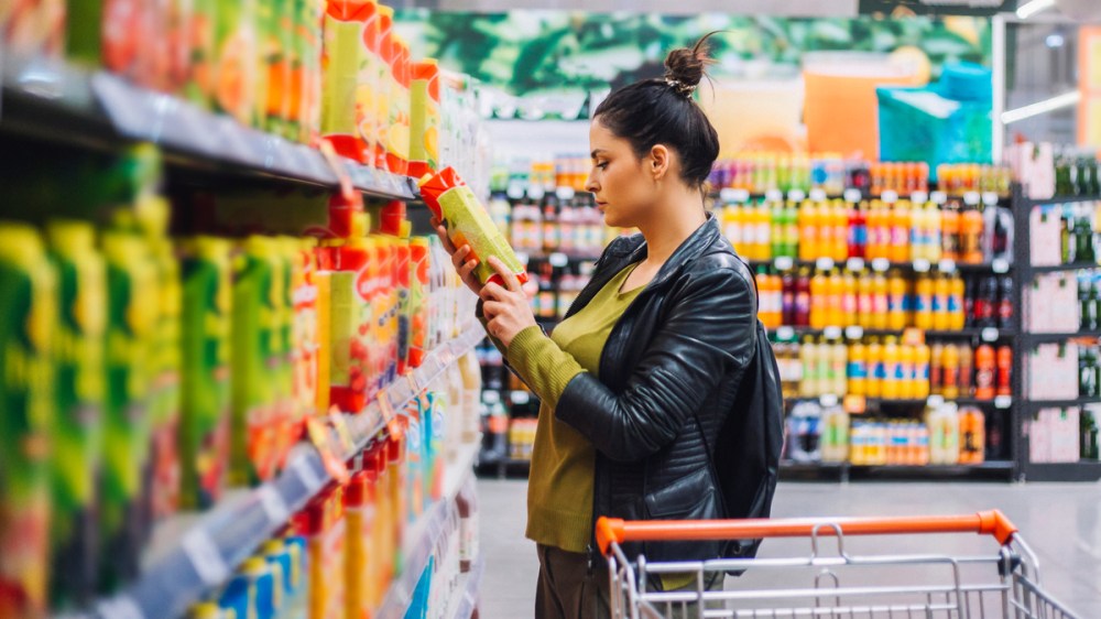 Woman looking at product information