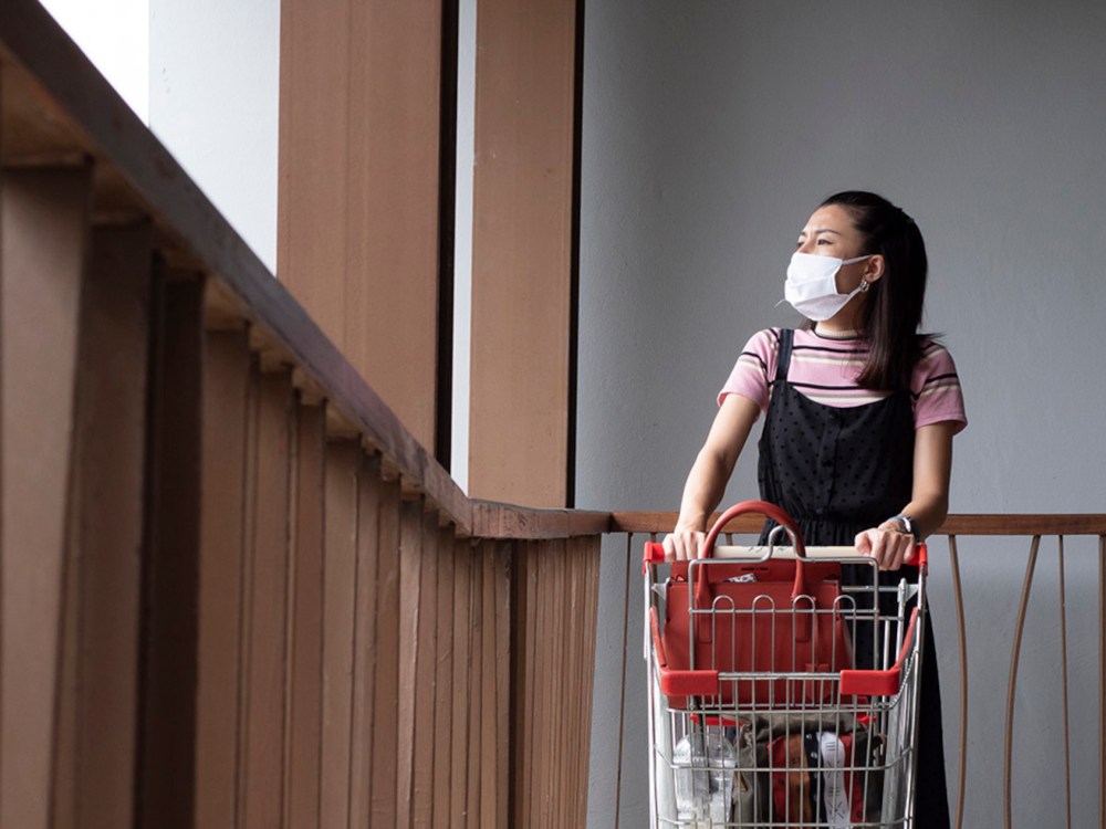 Woman shopping wearing mask