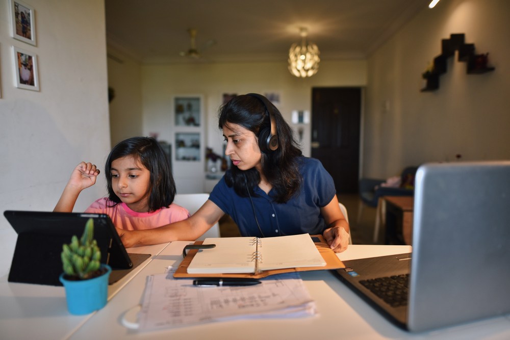 a woman in india and her child adjust to remote life post-pandemic