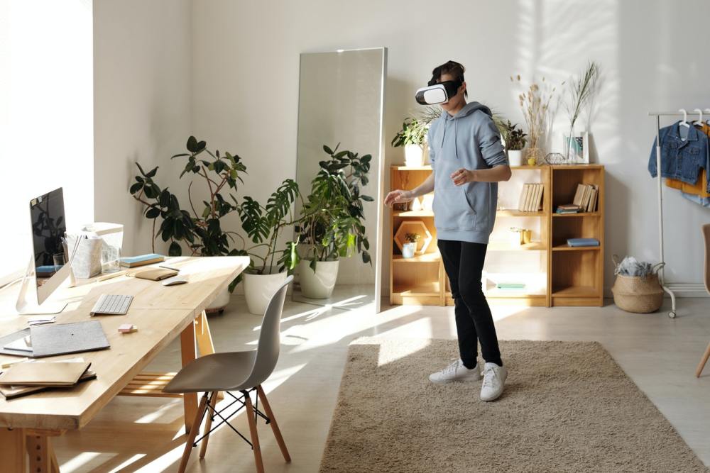 young man wearing a headset to enter the metaverse