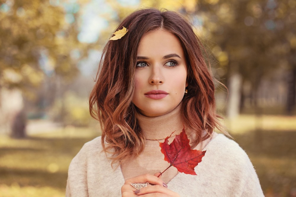 A woman modeling a fall beauty trend