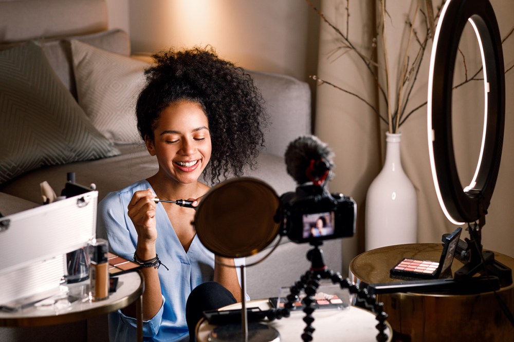 Young women applying a mascara beauty and health innovation