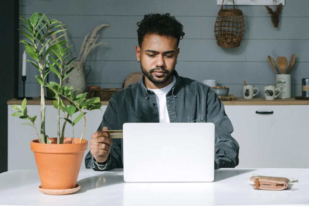 A man shops for ecommerce holiday deals