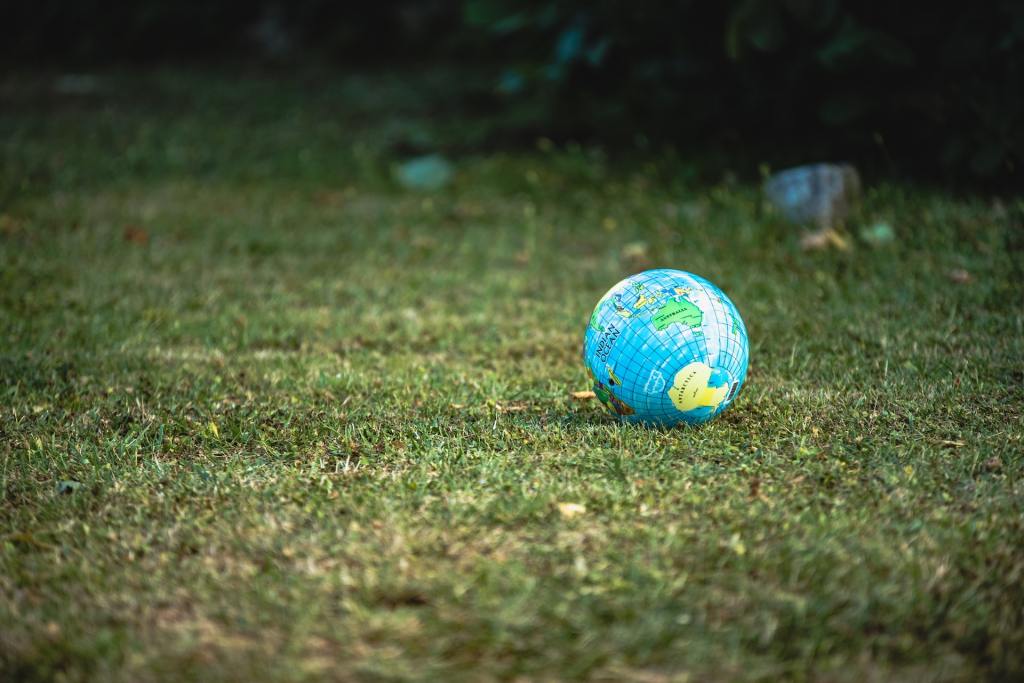 Blow up globe sitting on lawn