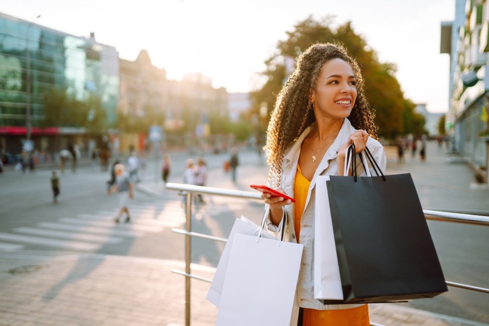 woman carrying shopping bags