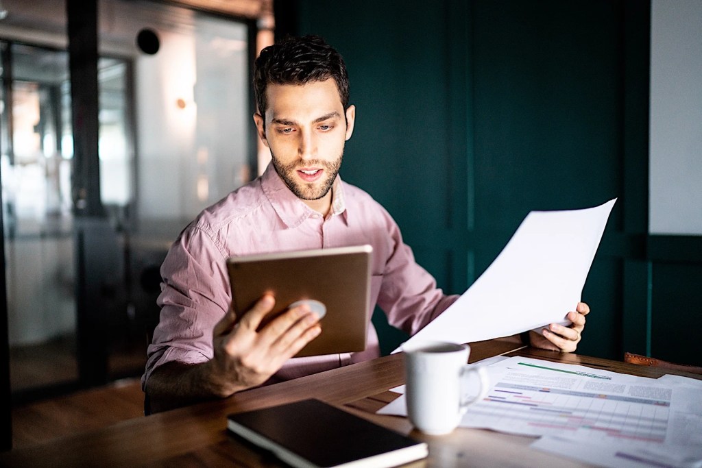 man with data in an office