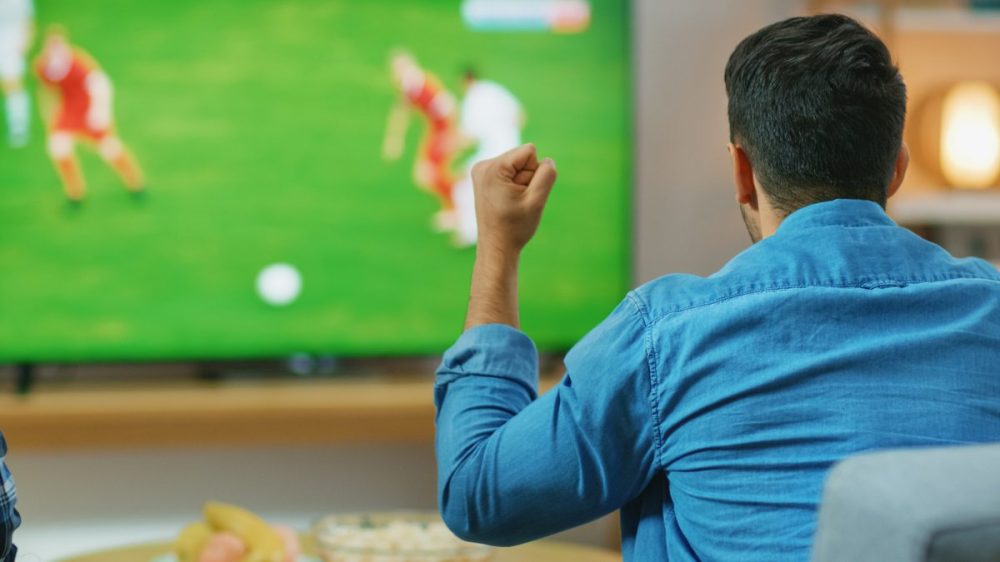 Watching sports on large screen TV