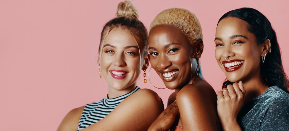 3 women smiling