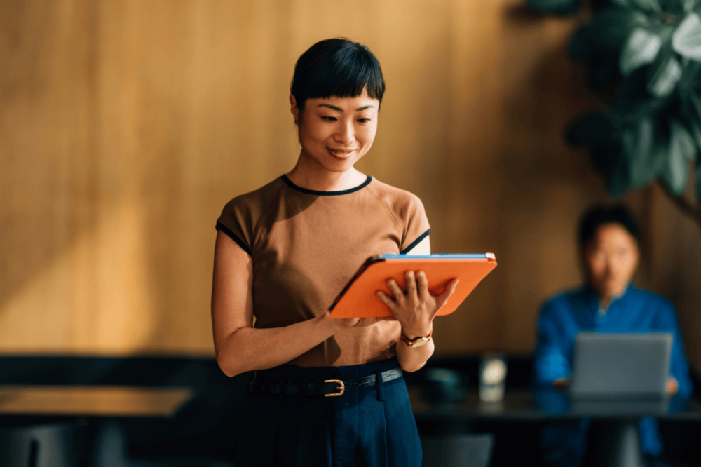 asian girl with a tablet