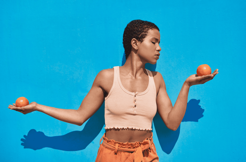 women with oranges