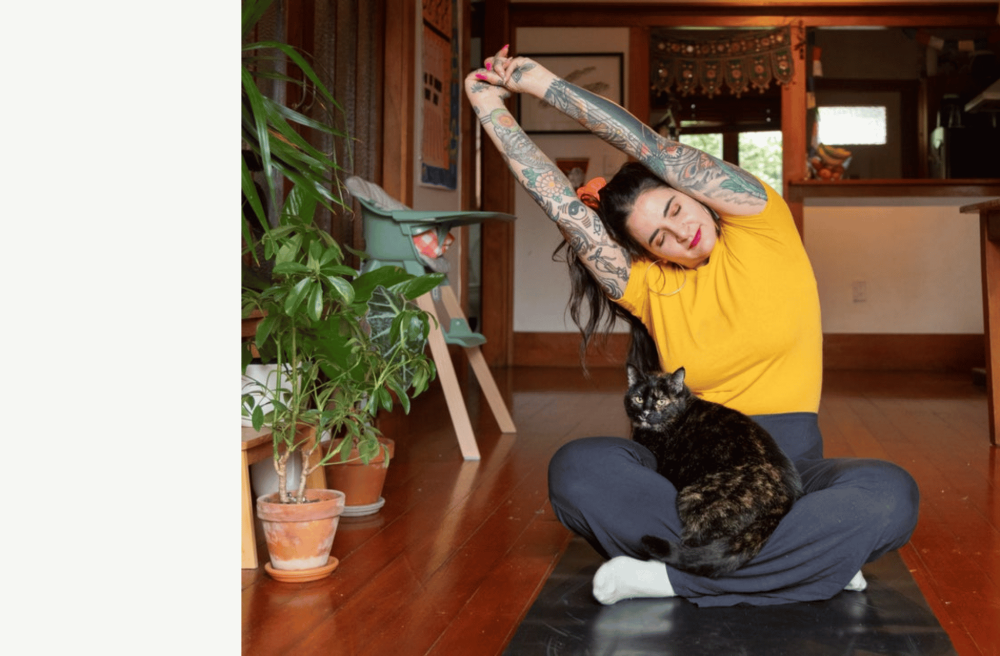 women and her cat together