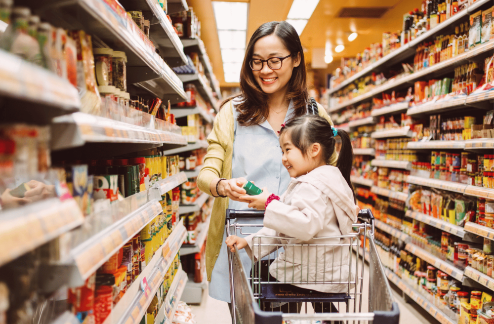 mom and her kid at supermarket