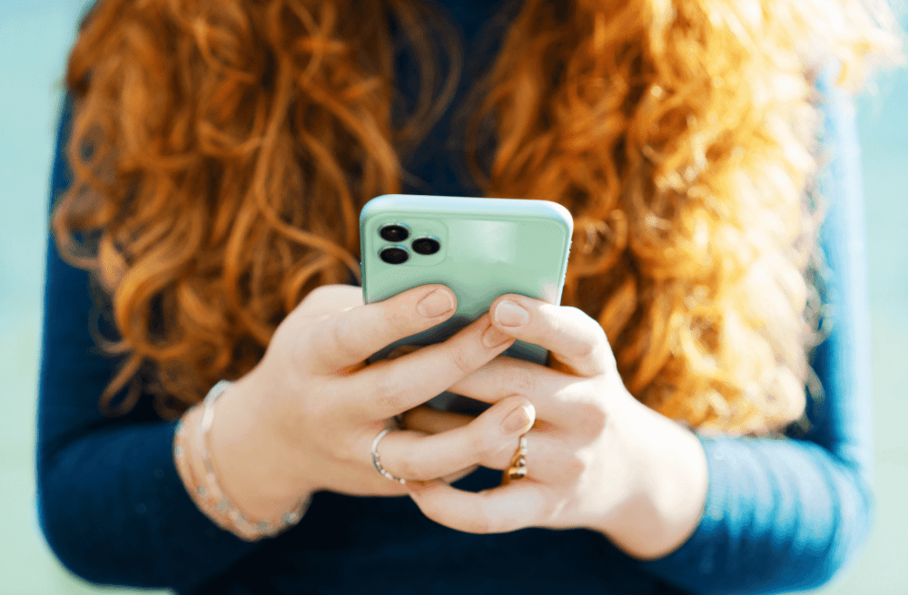 influencer with her mobile phone texting